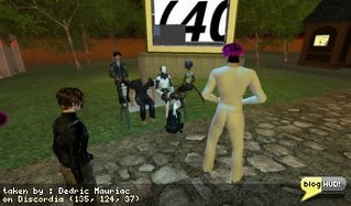Chatbots in Second life started with simple responses to keywords, then there was the next generation that integrated with chatbots on the internet. Now we have actual avatars as chatbots. Meet Social Autopoiesis. You can think of him as an NPC (Non-Player Character). He is hooked up to second life through libsecondlife and is using a program to respond to others with a few AIML files. This automation allows him to respond to people and keep in line with the current topic. However, you quickly realize he's just a bot after a few moments of chatting with him. He starts typing instantly. He's also dressed up as a robot similar to the ones in the movie, iRobot. From Dedric Mauriac via blogHUD
