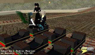 Acedia Albion, Analogue Montagne, and I talk about Trains. The main concern is that the trains here are no-mod. I've used Kitto Flora's trains for a long time. I liked it a lot, but wanted to change the colors. I made my own skin for the train and Kitto agreed to give me a discount if he could resell the skin. I see he has 2 more skins now so people can choose from 4 colors. In the end, Acedia was sold and got herself a nice black train. From Dedric Mauriac via blogHUD