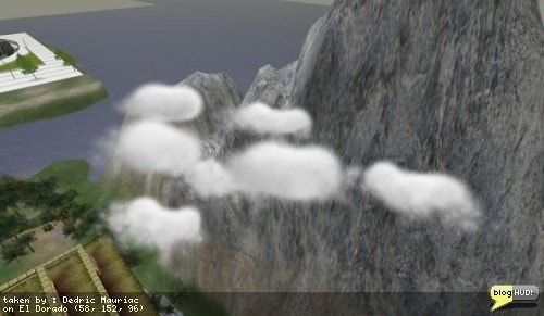 Now this is amazing. I love particles. The particles here appear to be fluffy white clouds. I'm not sure how it was done, but just watching them slowly drift is a sight to see. They look like cotton balls. The wind also affects them over time so they start to move around. Wow. Construction Kit is the person who made the clouds in this sim. The only thing that takes away from the view is the little green words appearing over of each cloud "Running". If you touch the invisible boxes under them, they stop making particles and the text changes to "Stopped" in red. From Dedric Mauriac via blogHUD
