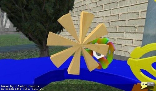 After ELLiebob downloaded tokoroten, she spent five minutes and was already uploading some designs. Here is her first one. It looks a bit like a flower. I think we are all going to have a lot of fun with sculpties. Gore dropped by to check out all our little projects as well. The three of us are kind of limited with what we can do with regular 3-D programs. Rokuro and Tokoroten really help us out a lot. Still, it would be nice if we could learn Blender and have more control over what we can make. From Dedric Mauriac via blogHUD