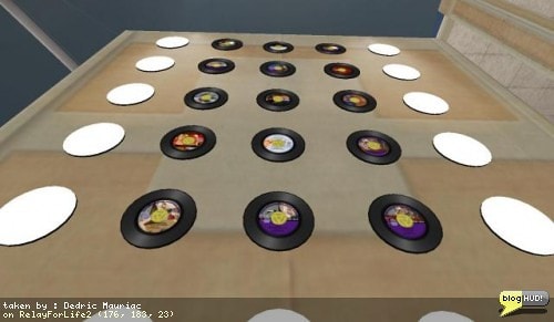 I've got 15 records setup from musicians within Second Life for our Groovy Scavenger Hunt. Dawn DeSimone sent in four songs that kept me busy most of the afternoon. Each record has its own artwork affixed to the cover of it to help tell them appart and personalize them. There is still time for other musicians to get in on this before the Relay for Life event kicks off this weekend. It's all free and I need a 10 second sound clip to sample each song. From Dedric Mauriac via blogHUD