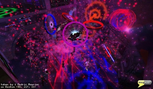 Timeless has a pretty interesting club here. The particles alone are mezmerizing. I get a little dizzy just looking at the particles comming at me against everything else. I'm on a dancing platform changing colors and rotating above the main dance floor. The place is really happening with rave music and a live audience with voice. You better watch out though. Just like a rave, you can get hurt here. From Dedric Mauriac via blogHUD
