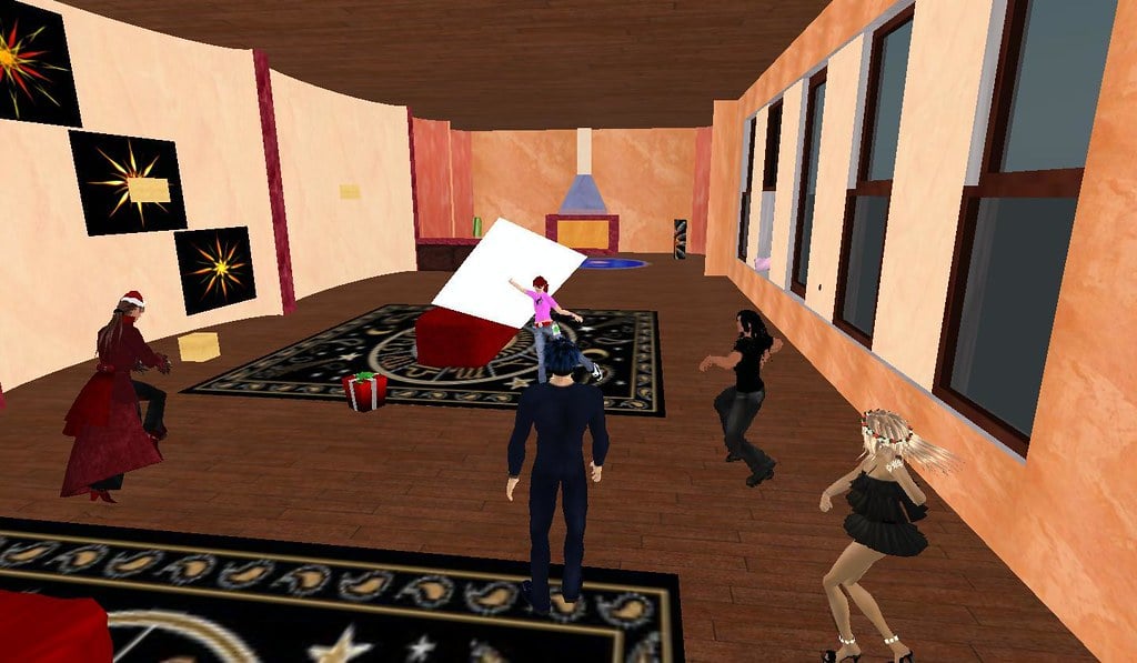 ELLiebob Bean rang me for help with one of my products. It seems she too has fallen suspect to my christmas bug. I created a christmas gift that you drop items into and the person who receives the gift can't touch the present until December 25 through the end of January. I came over and helped her install the fixed script. Kumi Kuhr got her christmas gifts in no time at all including a black evening gown, a snowman pulling a sled, and some candy canes. We all danced the day away and had a great after christmas party. Posted by Second Life Resident Dedric Mauriac. Visit Theretra.