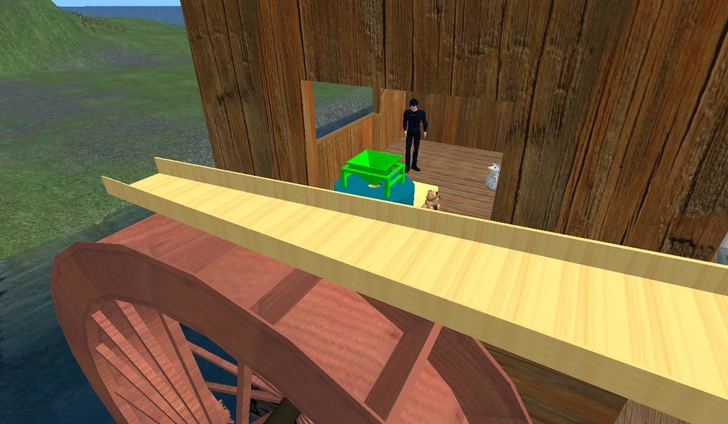 DrFran Babcock brought her friend over to woodbridge to show off my Grist mill. I hadn't taken the mill out of inventory for a while and found that the rotation of the wheel and gears were on the wrong axis. I finally found the problem was due to the root prim being aligned in the wrong direction. Her friend, Awenbunny Lisle was making her own and needed a reference for a tiny avatar shop. I took all the scripts out and handed her a copy to play around with. I offered to script it to work the correct way if she would texture it. Everyone seemed to be happy. Posted by Second Life Resident Dedric Mauriac. Visit Woodbridge.