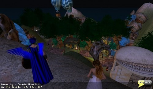 Looking over the temple, Sappheire Moonbeam and I stand silently in the wind. The night gives a nice ambience to the environement here. Oddline enough, The Sweater Song by Weezer is playing. It all goes together though. Fun times ... From Dedric Mauriac via blogHUD.com