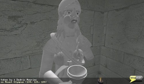 The oracle appears to be statue of a young maiden, full of life. She holds an empty challice in front of her. Her long white dress flows all the way to the floor. The incense are heavy and make my head feel a bit cloudy. I can't tell if she is speaking to me, or if it is voices behind the walls. I keep hearing the idea that I should wait for the oracles servant. I wonder who this mystereouse servant is. Should I be rubbing, kissing, or tickling her feet for answers? From Dedric Mauriac via blogHUD.com